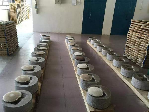 普洱茶石磨压制——制茶人的传统手艺