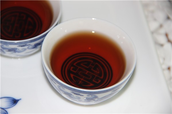 采用“湿仓”是否会加快普洱茶的陈化？