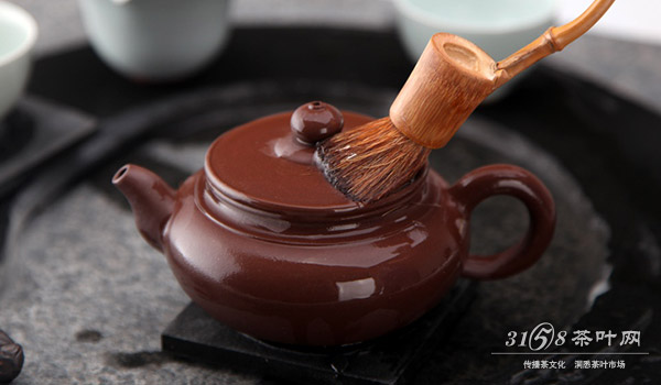 紫砂壶怎么开壶与养壶茶壶被茶渍浸得发黑怎么办