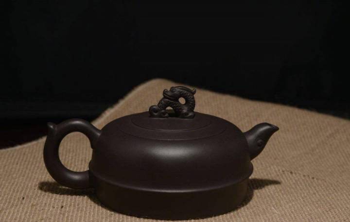 如何根据紫砂壶的高矮选择所泡之茶？